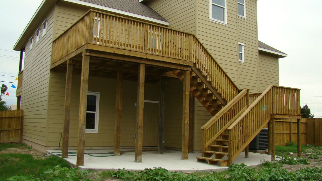 ELEVATED WOOD DECK with HANDRAILS at BACK YARD